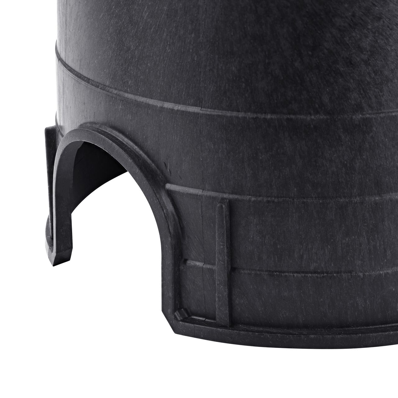 Closeup of the NDS 6 in. Round Standard Series Black Valve Box PVC pipe hole which allows irrigation pipes to pass through the box interior (NDS 2107BC) so that the box does not rest on the pipe.