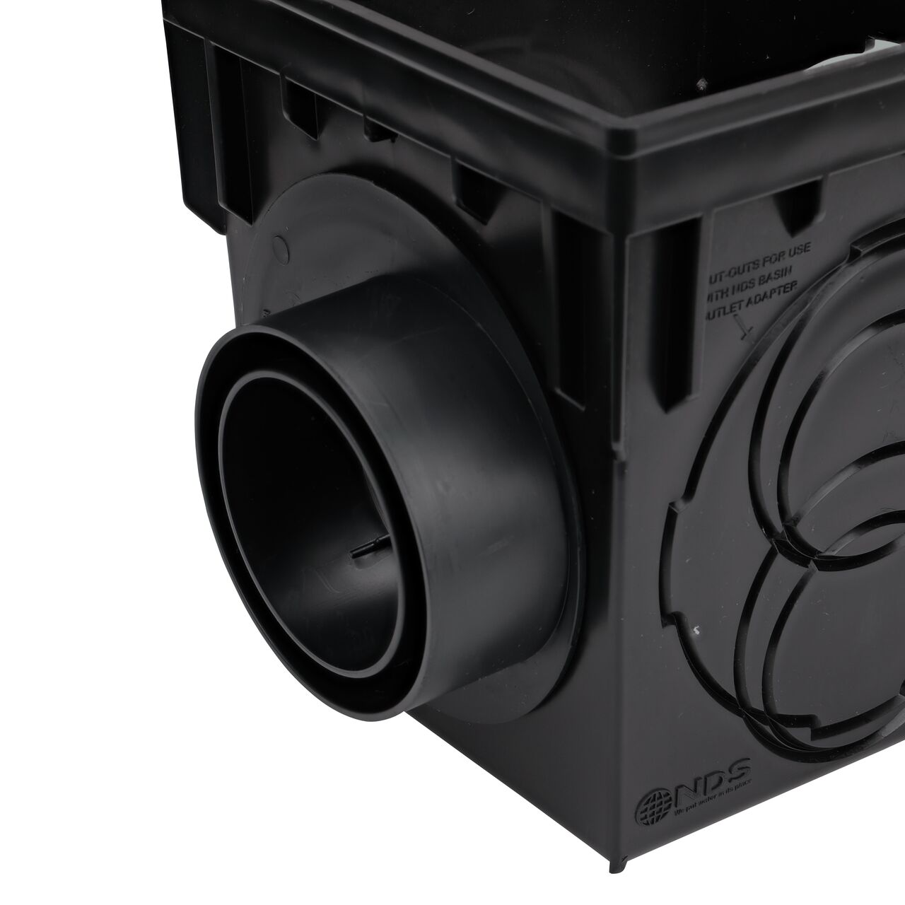 The NDS Offset Outlet Adapter (NDS 1245) installed on an NDS 9 in. Catch Basin Drain (NDS 900) with the offset/outlet in one side position