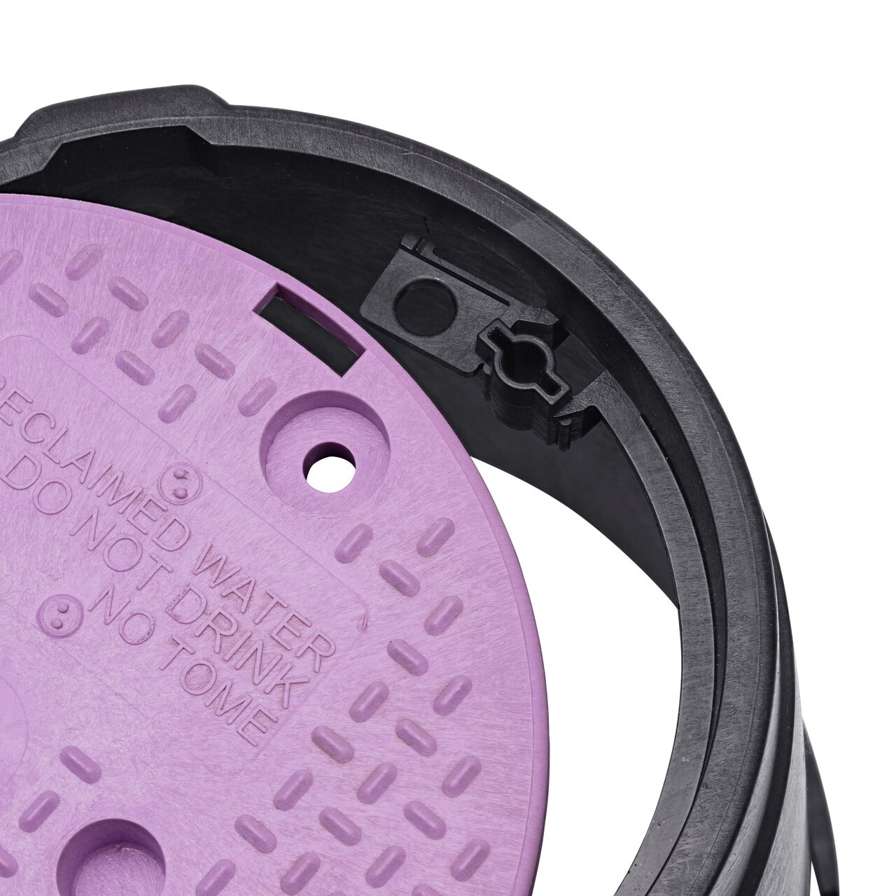 Align the bolt hole on the lid with the traditional bolt hole or the universal locking mechanism from the NDS 10 in. round standard series black box and purple reclaimed water cover (NDS 111BCR) for a secure fit