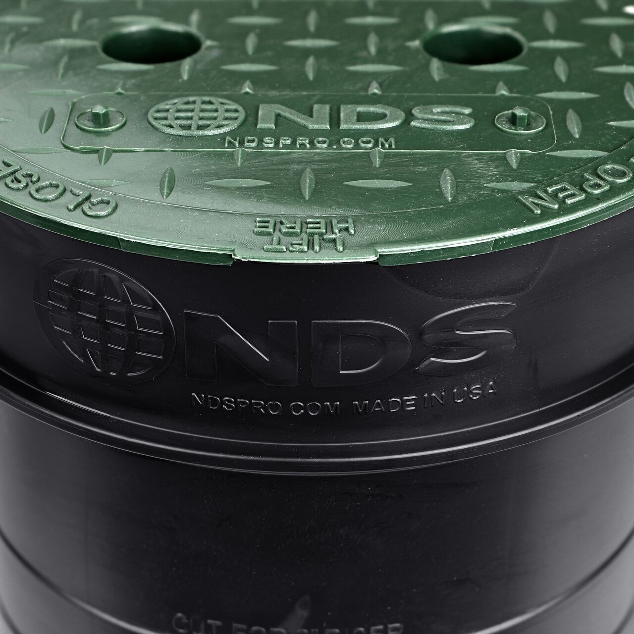 Closeup view of the 6 in. NDS Spee-D® Riser (NDS 101R) installed in the 6 in. Standard Series Valve Box with the Irrigation Control Valve Cover installed on the top of the riser (NDS 2107BC)