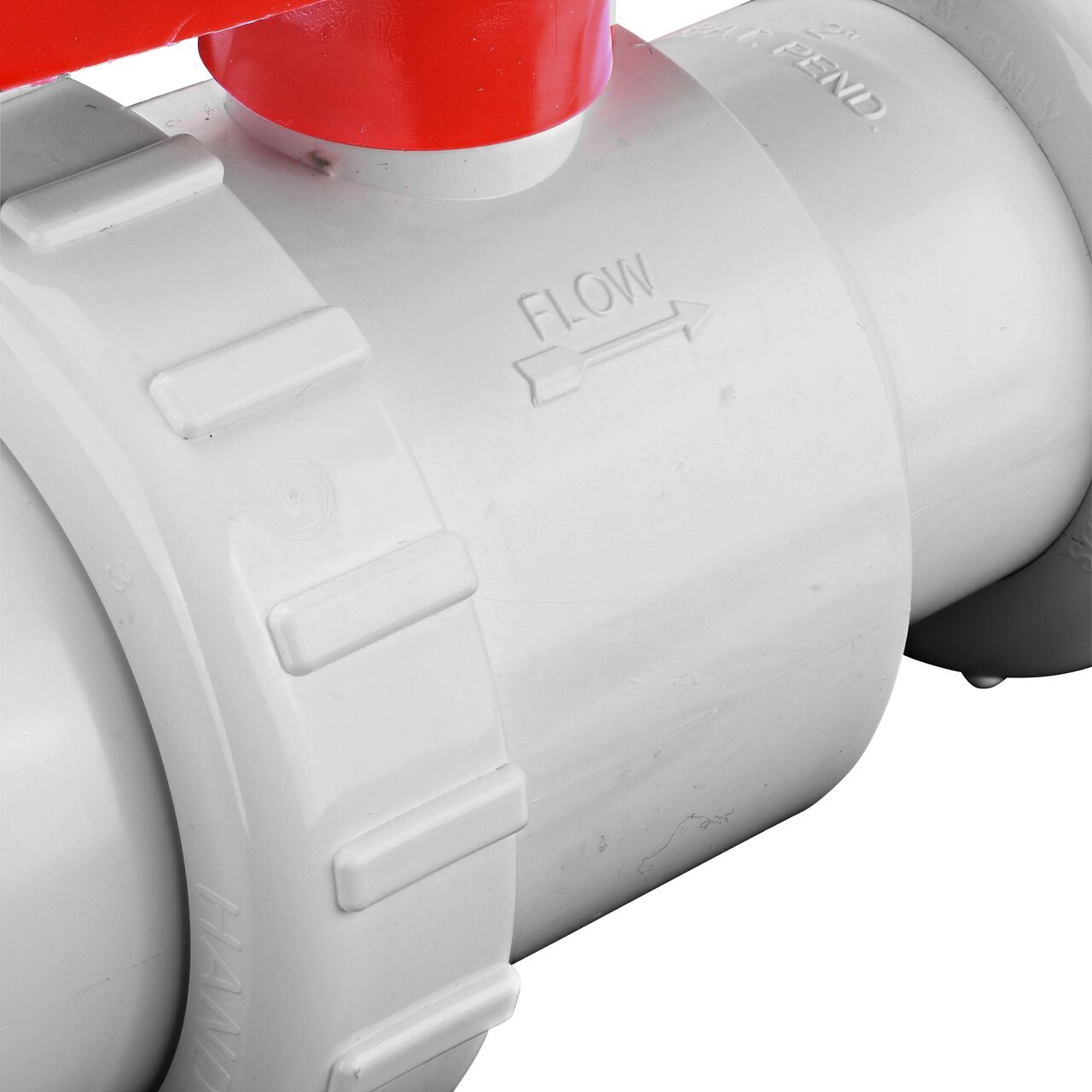 Closeup of the outside arrow showing water flow direction on the NDS White 2 in, IPS U X U Checkmate PVC Swing Check and Ball Valve Combination (NDS 2200-20TU)