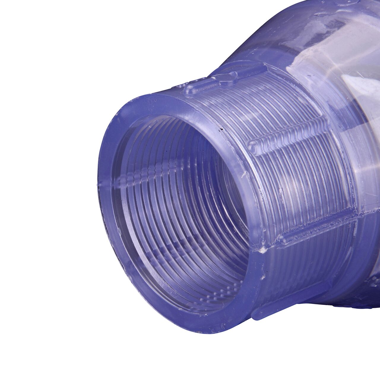 Closeup of the outlet end of the NDS Clear 1-1/2 in. female end by female end PVC Swing Check Valve (NDS 1520C15F) which prevents backflow in pipelines
