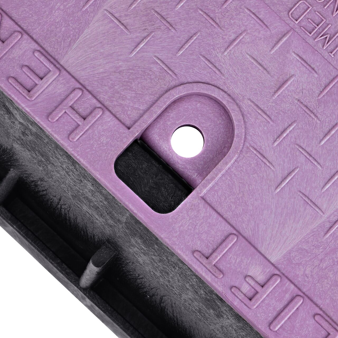 The valve box lid securely in place on the NDS 13 in. X 20 in. Rectangular Standard Series Black Tapered Extension Box and Purple Reclaimed Water Cover (NDS 119TBCR) keeping components protected against the elements, foot traffic, lawn care equipment, and potential vandalism while keeping them out of sight
