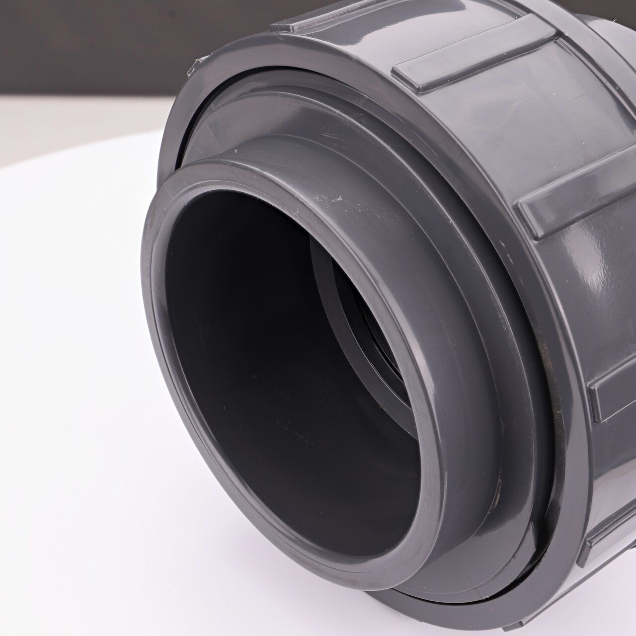 Closeup view of one slip end on the NDS 3 in. PVC Union (NDS U-3000-S) which provides a corrosion-free connection between pipes and prevents costly property damage