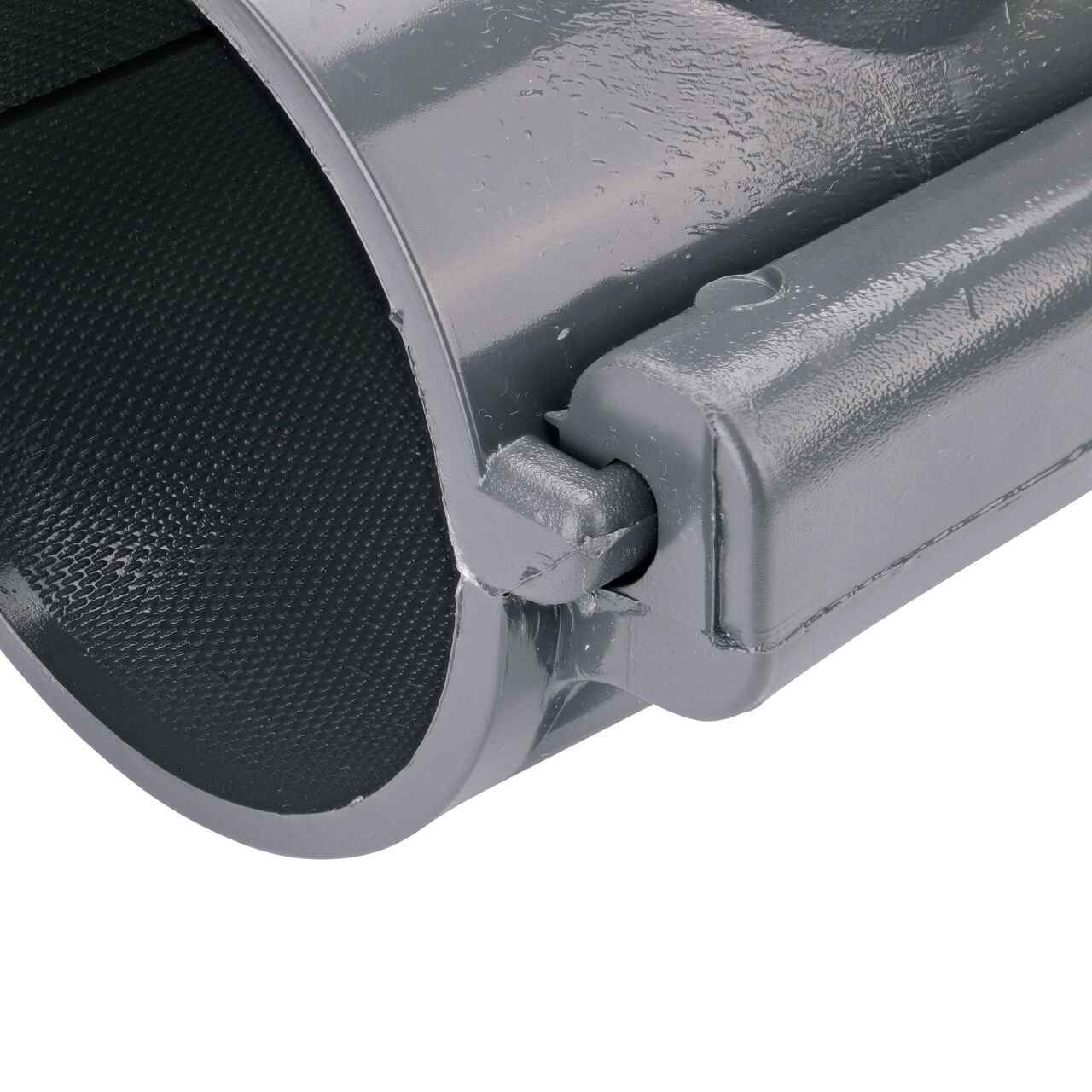 Closeup of the hinge closed on the NDS Clamp-It™ Rigid PVC Saddle with 1-1/2 in. FPT connection on top (NDS 443015) for 3 in. PVC pipe
