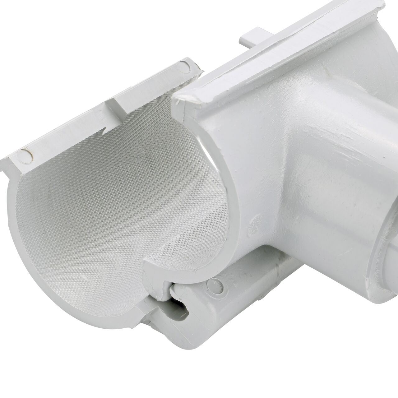 Closeup view of the hinge on the 2 in. NDS Flo-Tap™ Rigid PVC saddle with 1-1/2 in. socket or 2 in. spigot connection on top (NDS 3220) in the opened position that allows for easy installation onto Schedule 40 or Schedule 80 PVC pipe