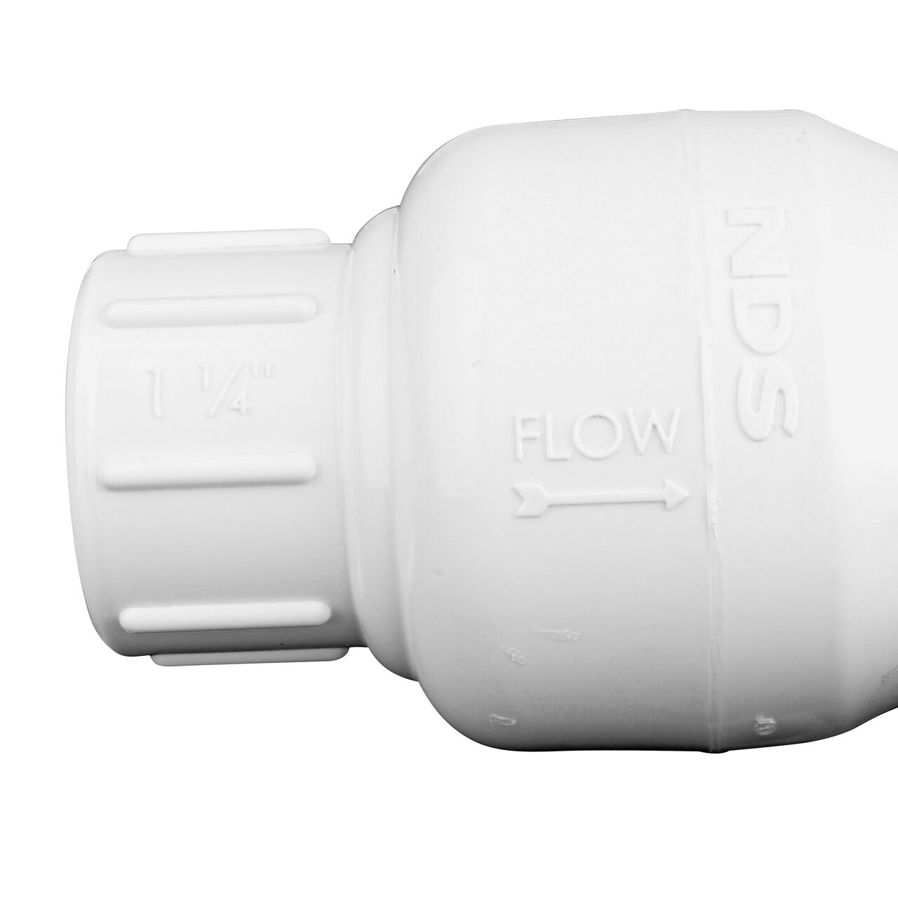Closeup of the arrow showing water flow of the NDS White 1-1/4 in. slip end by slip end PVC Spring Check Valve (NDS 1011-12, NDS 1012-12)