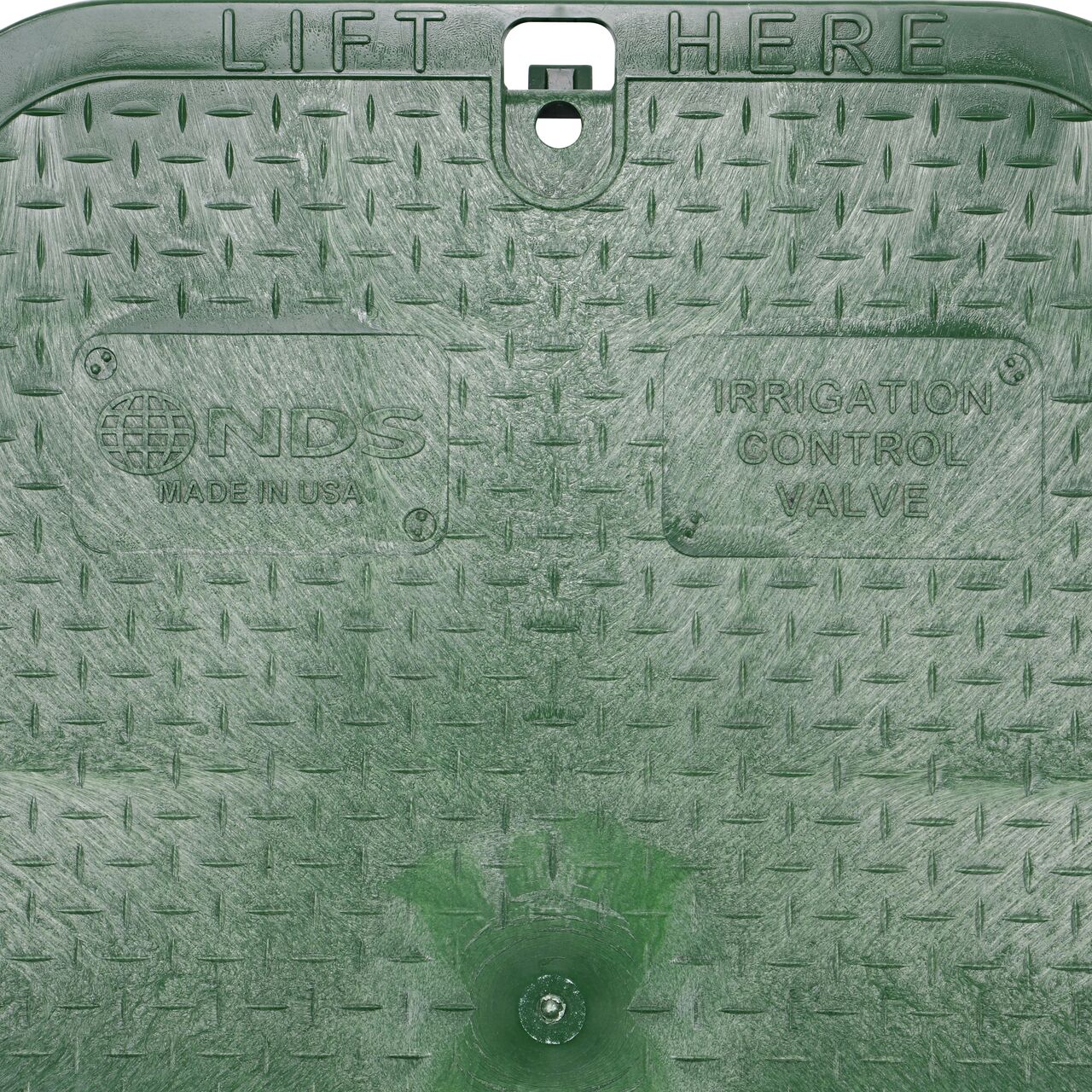 Closeup view of the irrigation control valve markings on the green irrigation control valve cover (NDS 117C) for the NDS 14 X 19 in. Rectangular Standard Series Valve Box