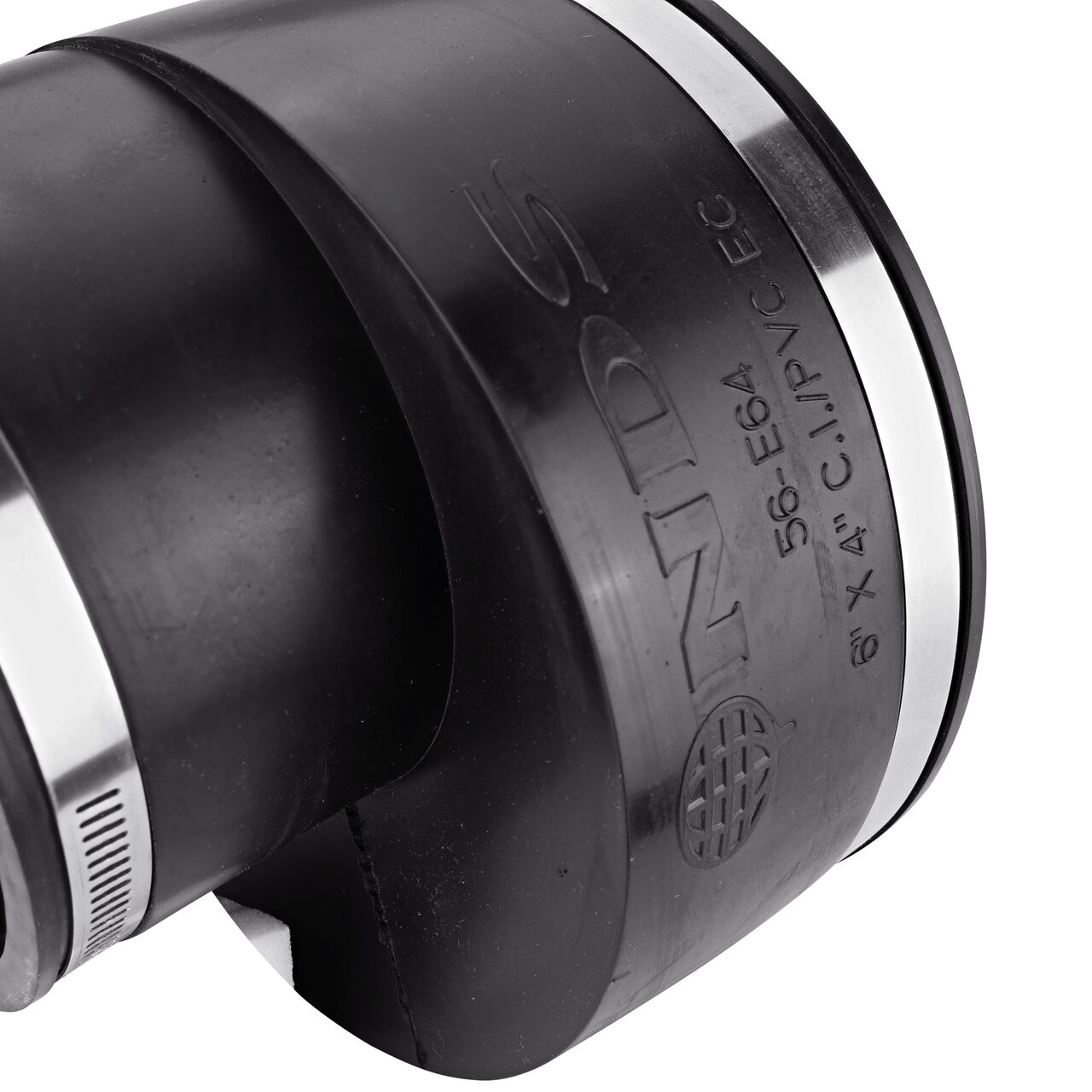 Closeup view of the NDS 6 in. X 4 in. flex eccentric coupling mark showing the size and compatible cast iron/sewer and drain or DWV/copper/steel/lead pipes eliminating guesswork on the job (NDS 56-E64)