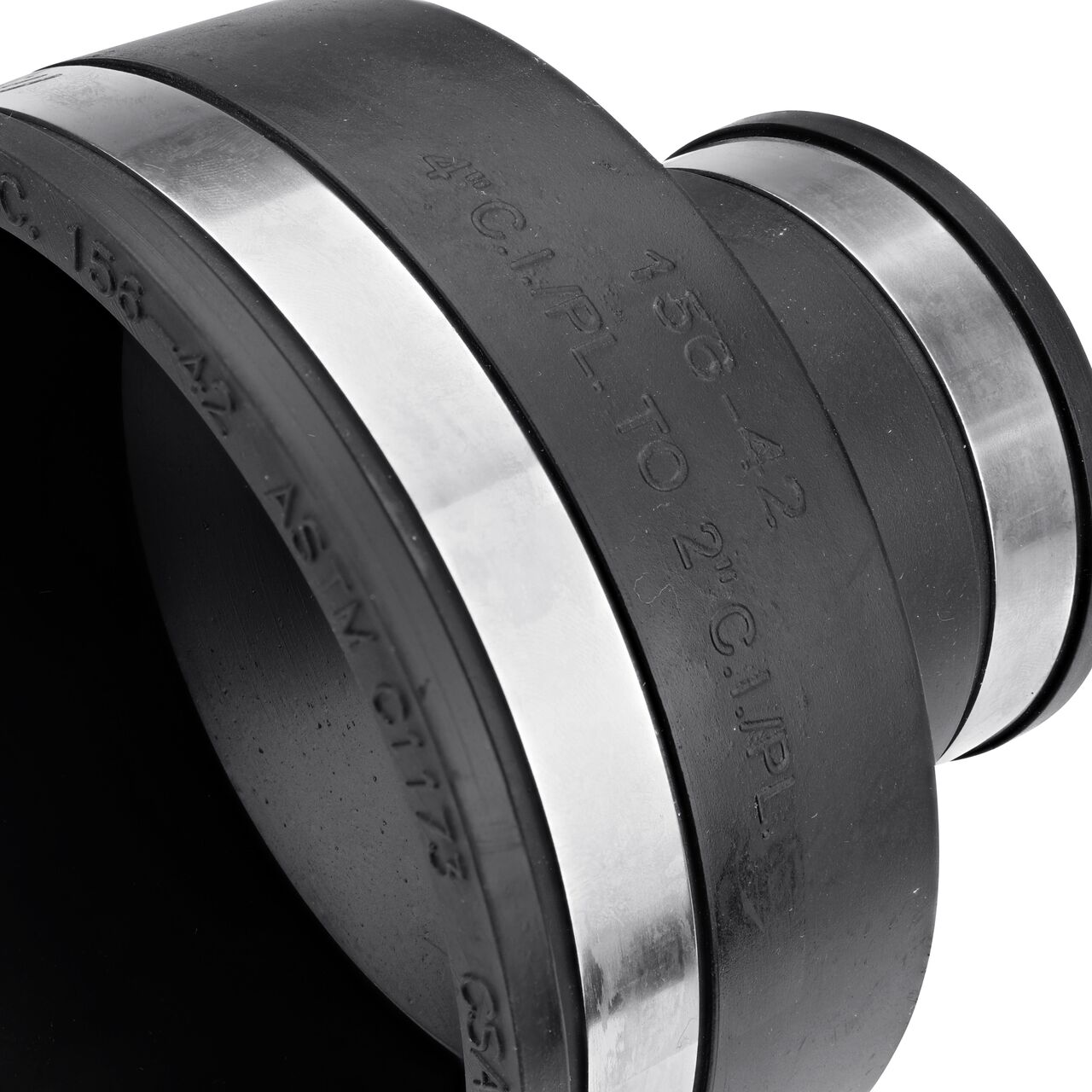Closeup view of the NDS 4 in. X 2 in. flex coupling mark showing the size and compatible cast iron/sewer and drain or DWV/copper/steel/lead pipes eliminating guesswork on the job (NDS 56-42)