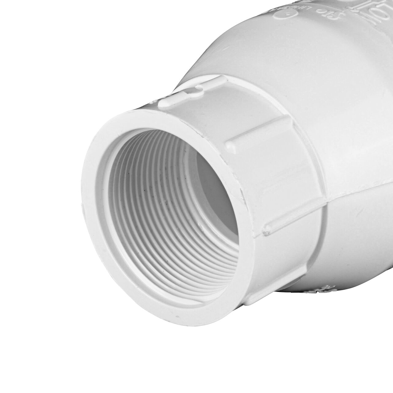 Closeup of the outlet end of the NDS White 1-1/2 in. female end by female end PVC Swing Check Valve (NDS 1520-15F) which prevents backflow in pipelines