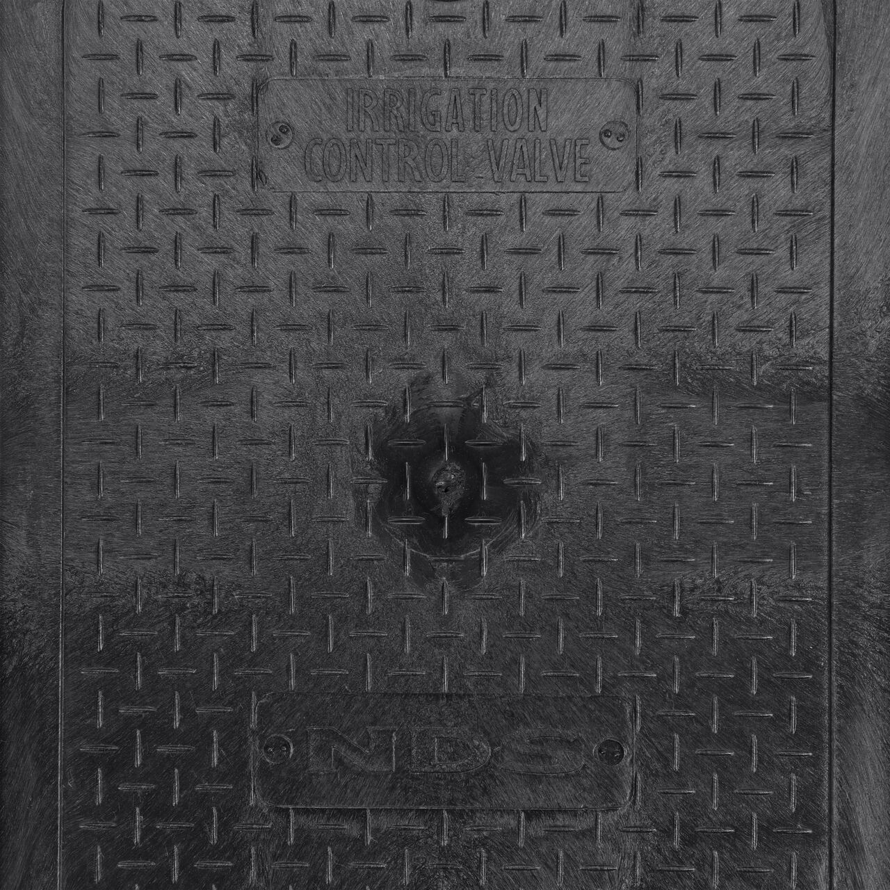 Closeup view of the Irrigation Control Valve markings on the Black Irrigation Control Valve cover (NDS 113CB) for the NDS 14 X 19 in. Rectangular Standard Series Valve Box