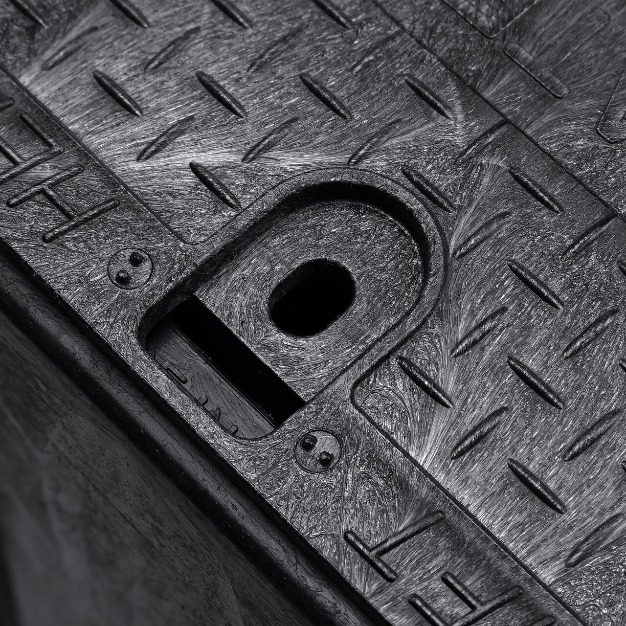Closeup view of the Black box and Black cover fully assembled, showing locking tabs, bolt hole connection point and reinforced edges on the side of the NDS name of product (NDS 313BCBWBLK)