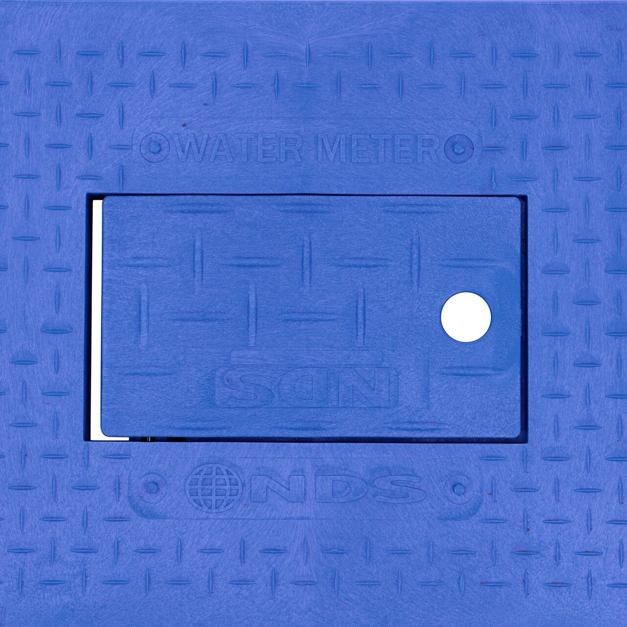 Closeup view of the Water Meter markings and Plastic reader door on the Blue Water Meter Drop-In cover for the NDS 14 in. X 19 in. Rectangular Standard Series Meter Cover (NDS D1200-DIBLRDL)