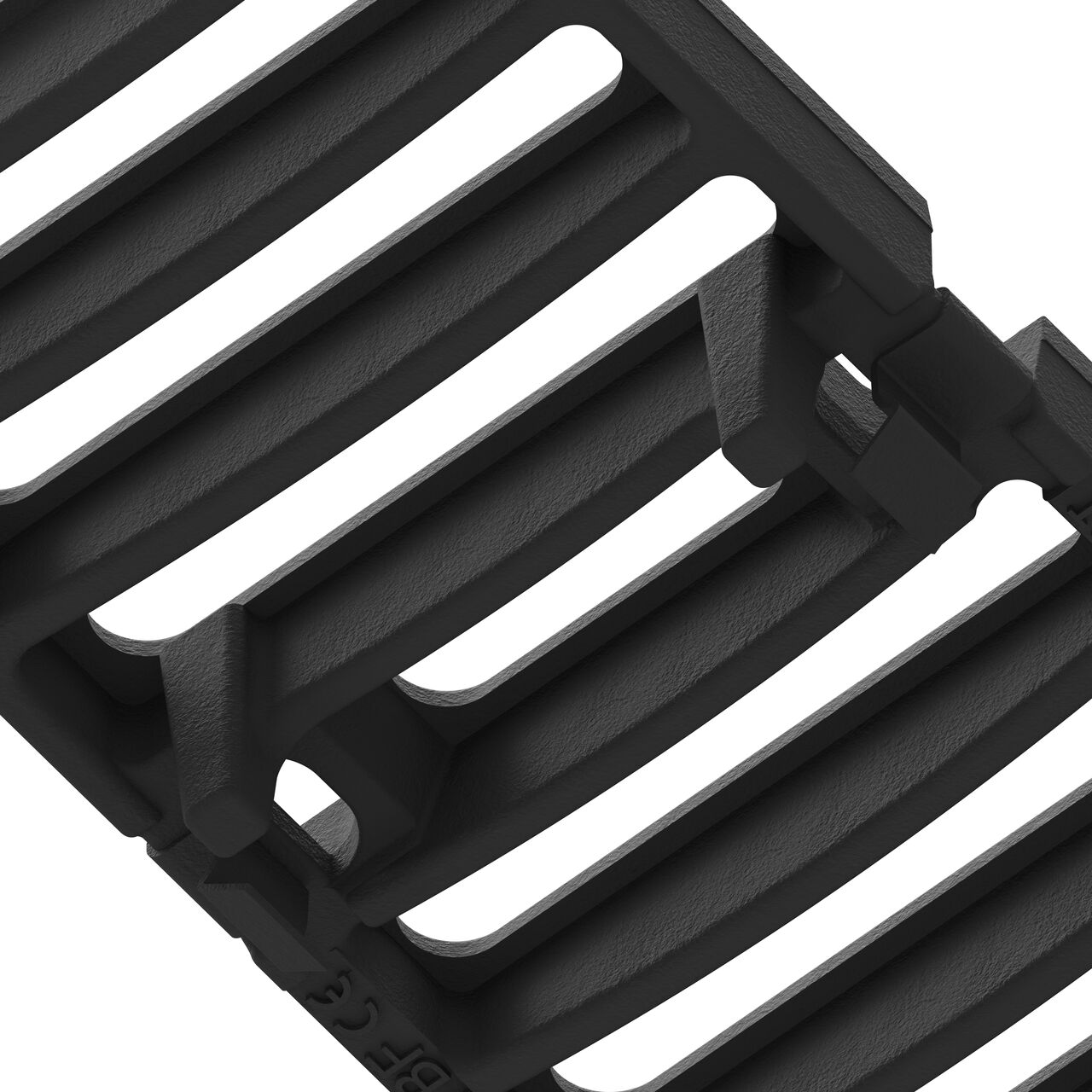 Underside of the class E slotted ductile iron BG-FILCOTEN® 100 Trench Drain Grate (NDS 17010105) showing part number, support legs, and secure clips
