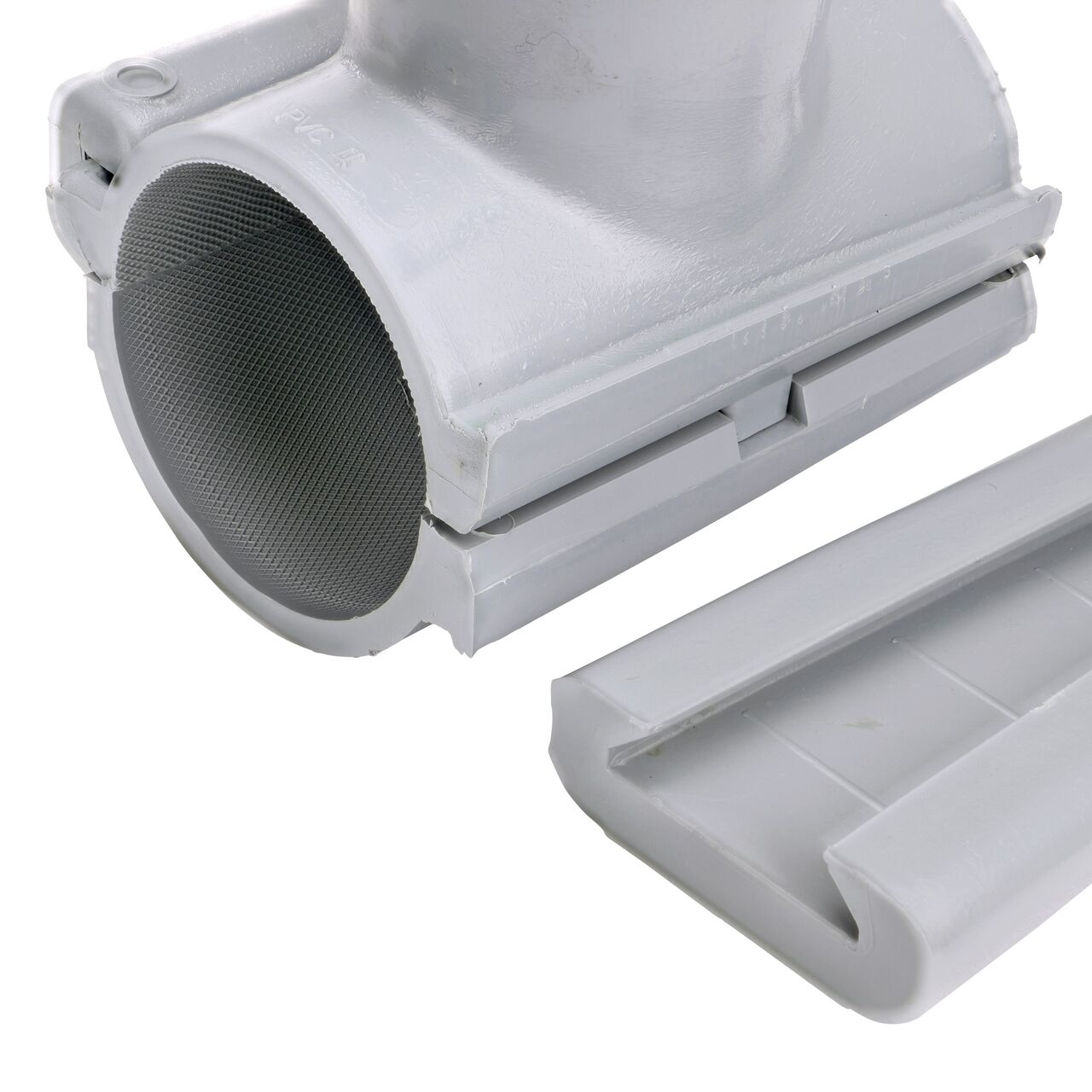 Closeup of the wedge latch uninstalled on the NDS Clamp-It™ Rigid PVC Saddle with 1-1/2 in. FPT connection on top (NDS 422015) for 2 in. PVC pipe