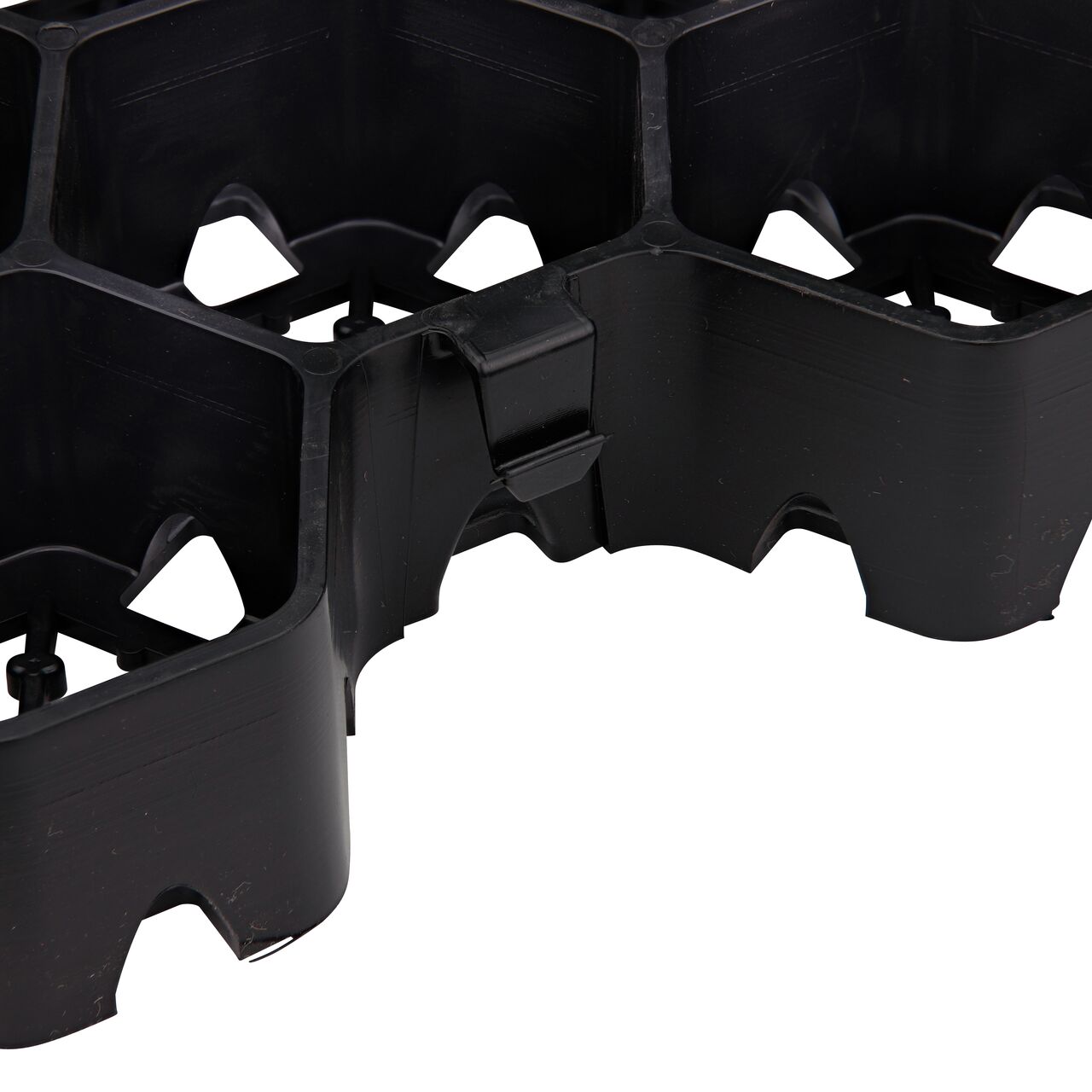 Closeup view of the NDS Tufftrack™ Grass Paver (NDS TT-24) hook side of the Tongue-and-groove locking system