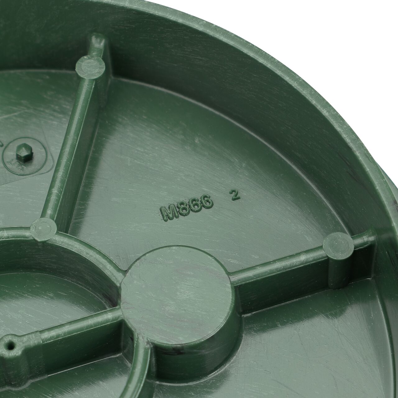 Closeup view of the structural support on the green irrigation control valve cover for the NDS 6 in. Round Standard Series (NDS 2107BC) that are load rated to withstand pedestrian traffic and the rigors of lawn care equipment