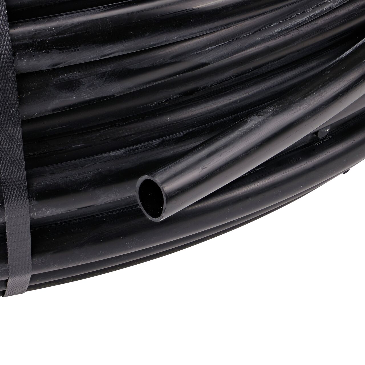 Outside end of the 500 foot black 3/4 in. Dura Flo™ Heavy-duty Dripline has 1.0 GPH Pressure Compensating Emitters in Groups of 3 spaced 6 in. apart
