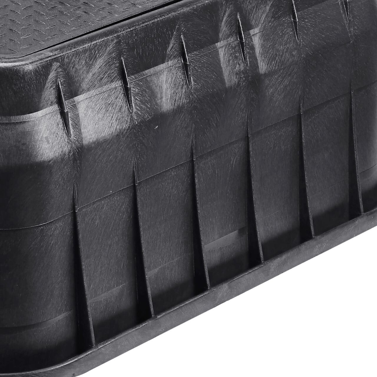 Closeup view of the pipe hole on the Black NDS 17 in. X 30 in. Rectangular Standard Series Meter Box (NDS 126BCDMB) for water and irrigation pipe connections