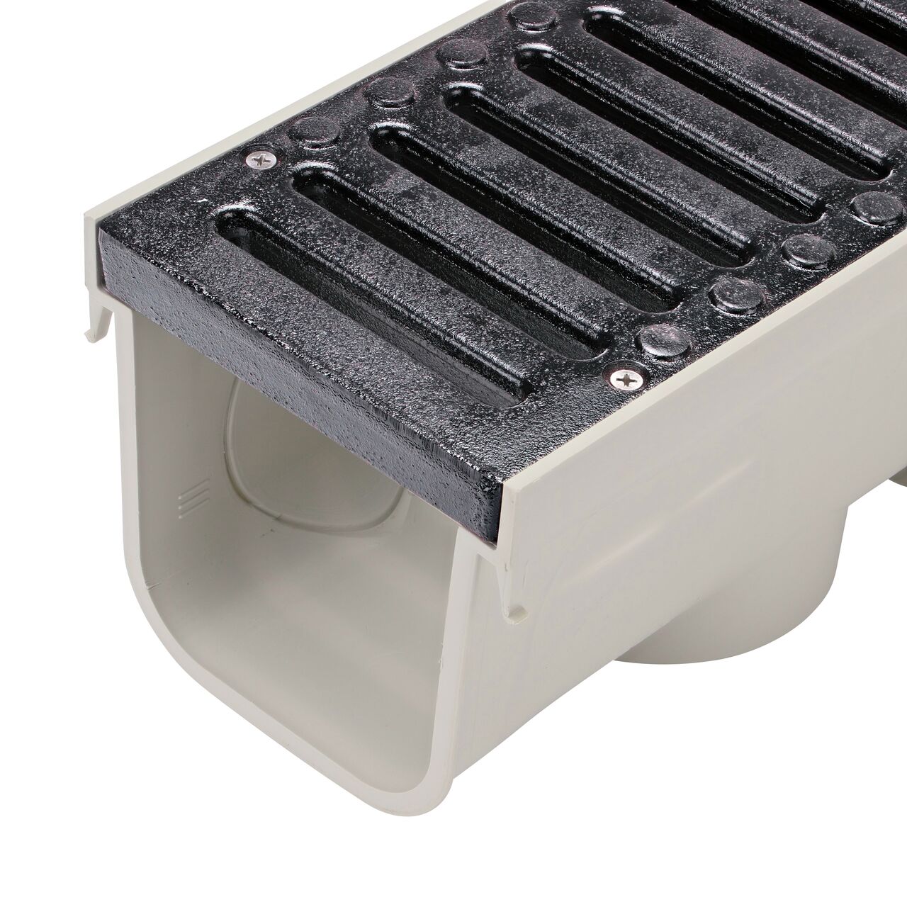 Closeup view of the NDS Ductile Iron 5 in. Pro Series Channel™ Drain Grate (NDS 823) installed on the 5 in. Pro Series Channel Drain (NDS 800)