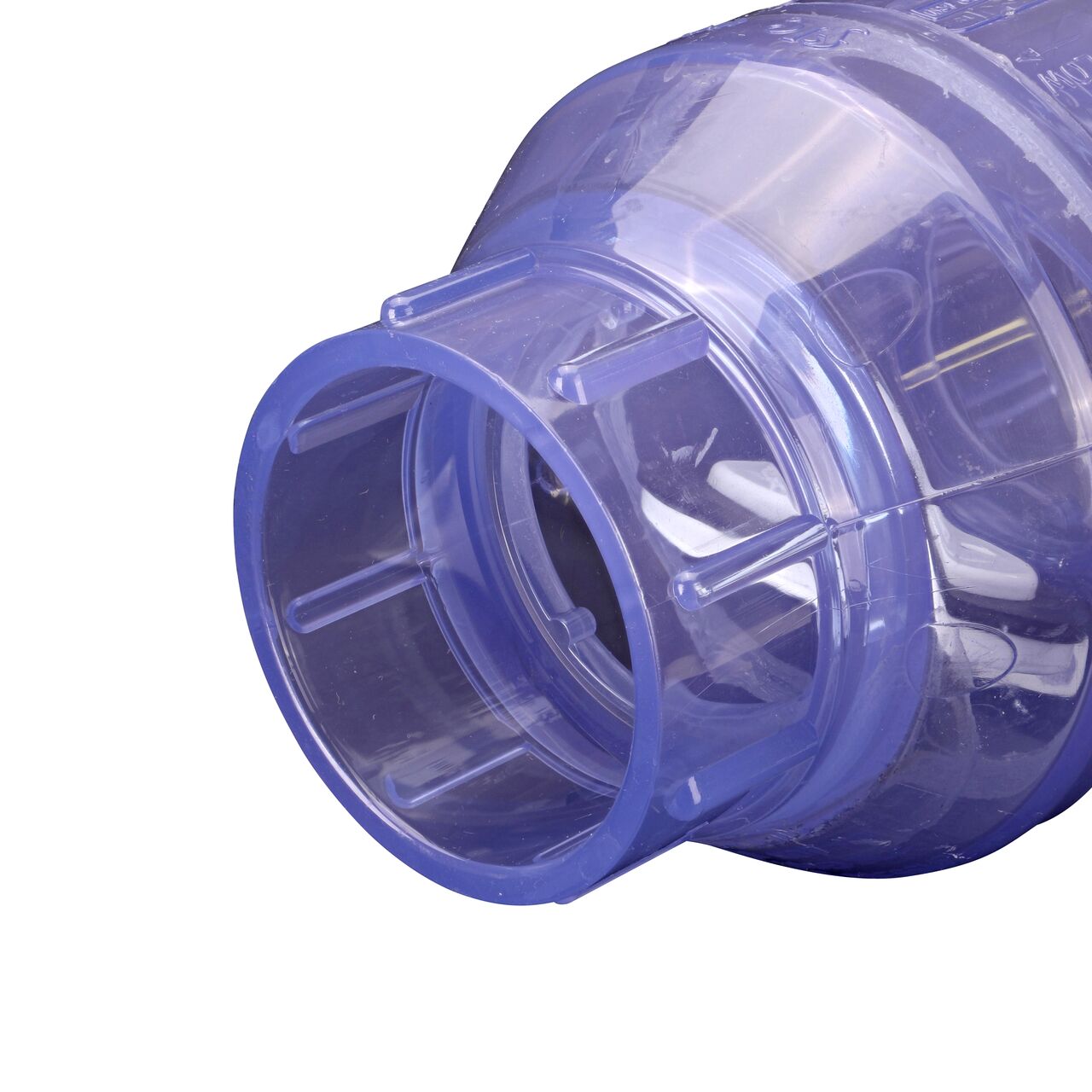 Closeup of the outlet end of the NDS Clear 2 in. slip end by slip end PVC Swing Check Valve (NDS 1520C20) which prevents backflow in pipelines