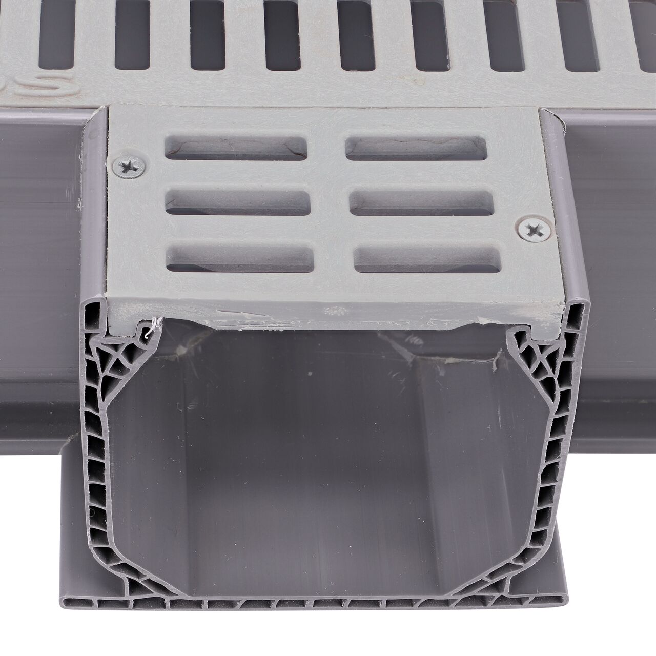 Closeup of the top of the opening showing the grate design of the NDS Gray Mini Channel™ Drain Tee and Grate (NDS 5370)