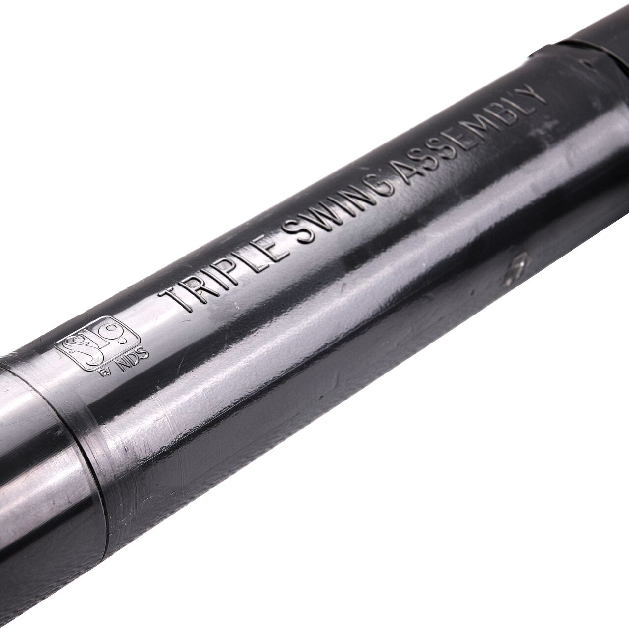 Closeup view of the NDS PVC Triple Swing Joints Assembly, Sch. 80 1-1/2 in. MPT for subsurface irrigation and sprinkler applications is clearly marked and offers flexibility that protects pipelines from damage (NDS TSA-1500-TT)