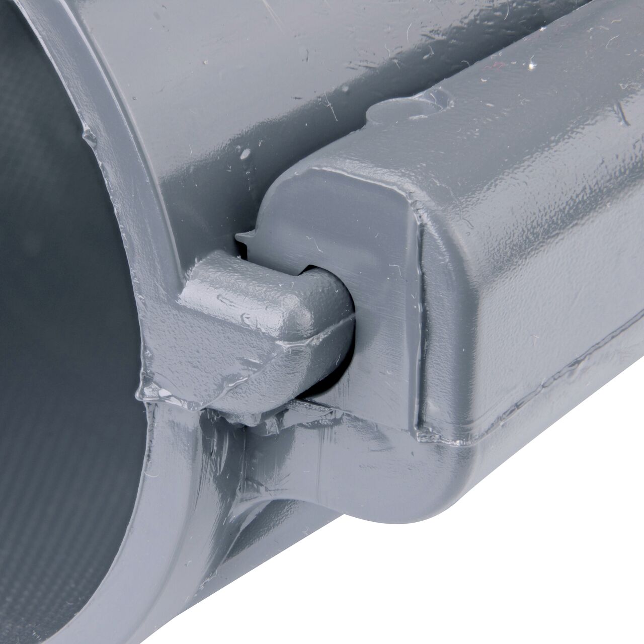 Closeup of the hinge closed on the NDS Clamp-It™ Rigid PVC Saddle with 3/4 in. FPT connection on top (NDS 443007) for 3 in. PVC pipe