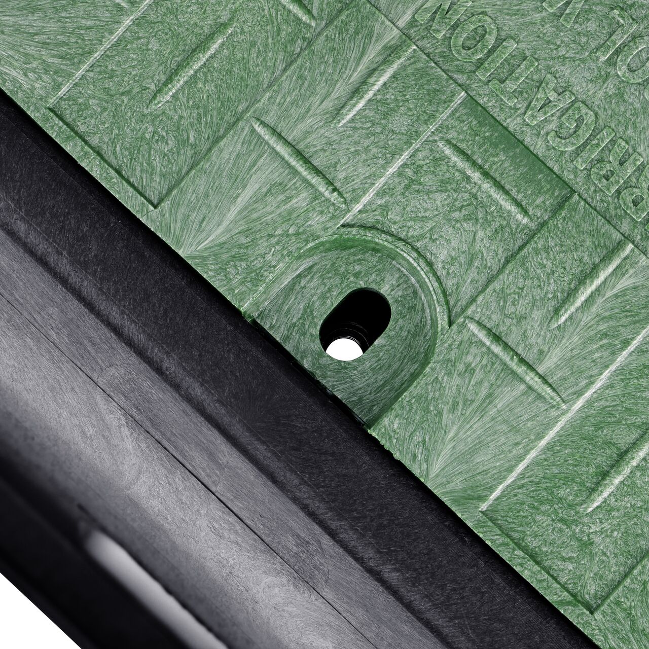 The drop-in valve box lid securely in place on the NDS 13 in. X 20 in. Rectangular Standard Series Black Box and Green Irrigation Control Valve Cover (NDS 117BCD) keeping components protected against the elements, foot traffic, lawn care equipment, and potential vandalism while keeping them out of sight