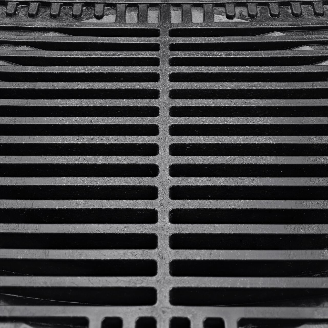 Closeup of the grate design of the NDS 9 in. Square Grate in Green Plastic (NDS 950*, NDS 950)