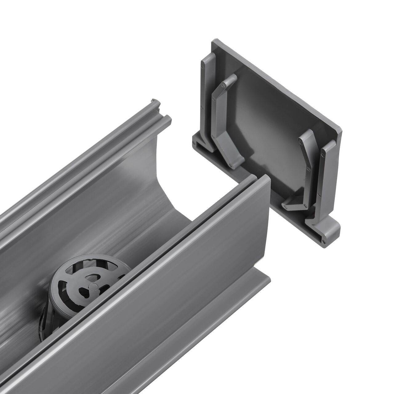 Install the NDS Mini Channel End Cap (NDS 547) to the NDS Mini Channel™ Drain Bottom Outlet (NDS 550) on the bottom outlet side to stop the flow of water and have it go down the bottom outlet through the pipes (NDS 550)