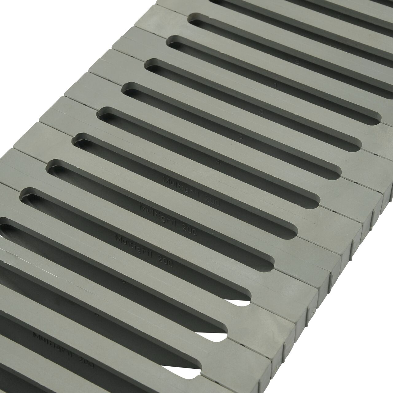 Angled close-up of grate openings on 8 in. Pro Series Channel Drain Grate Load Star Glass-Reinforced Nylon (SKU 838)