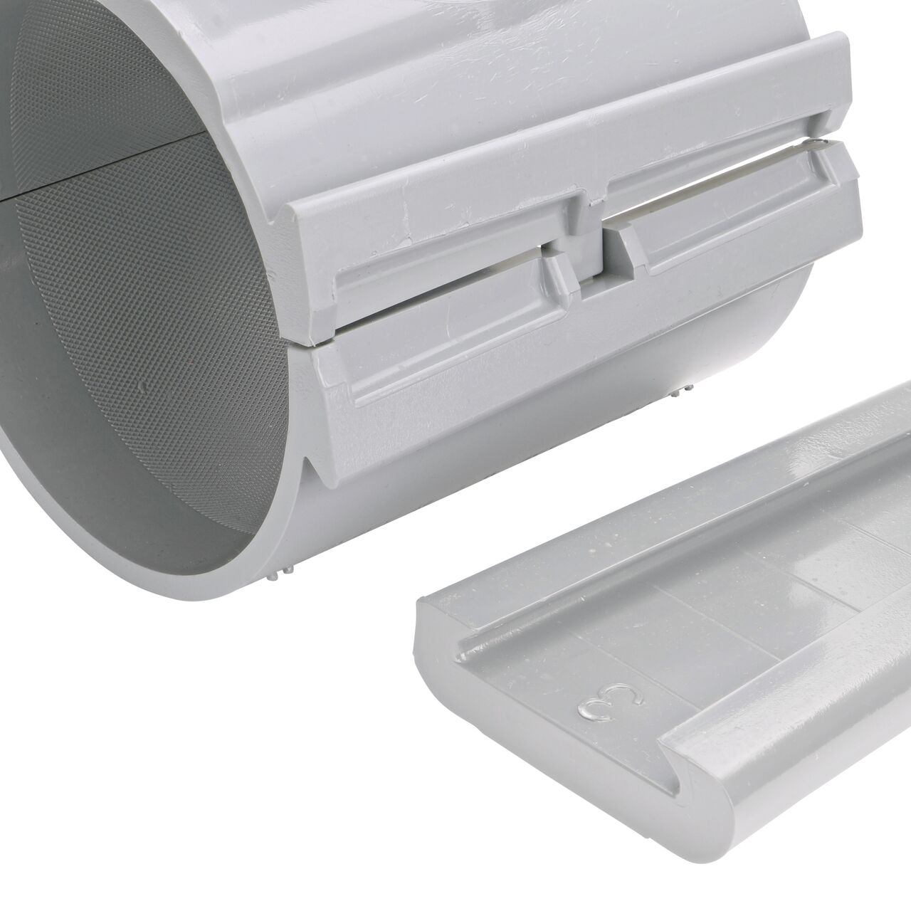 Closeup view of the patented wedge which unconnects on the 4 in. NDS Flo-Tap™ Rigid PVC saddle with 3/4 in. socket or 1 in. spigot for easy installation (NDS 3140)
