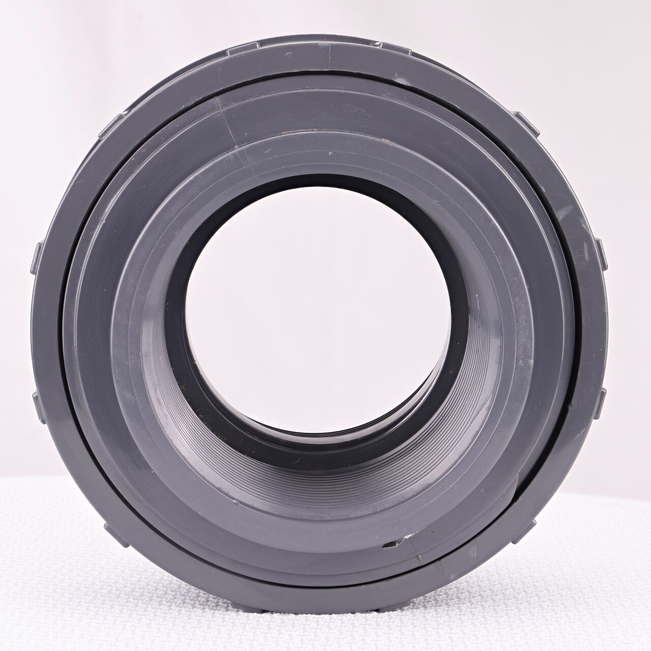 The inside of the threaded NDS 3 in. PVC Union which allows water to flow through while preventing leaks and made of durable PVC plastic (NDS U-3000-T)