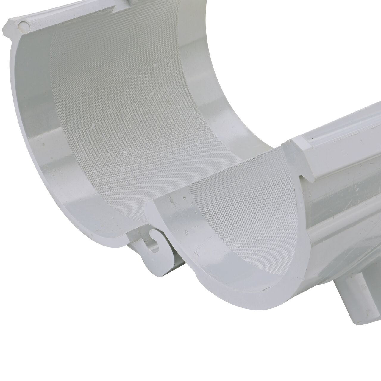 Closeup of the hinge open on the NDS Clamp-It™ Rigid PVC Saddle with 1 in. slip connection on top (NDS 454010) for 4 in. PVC pipe