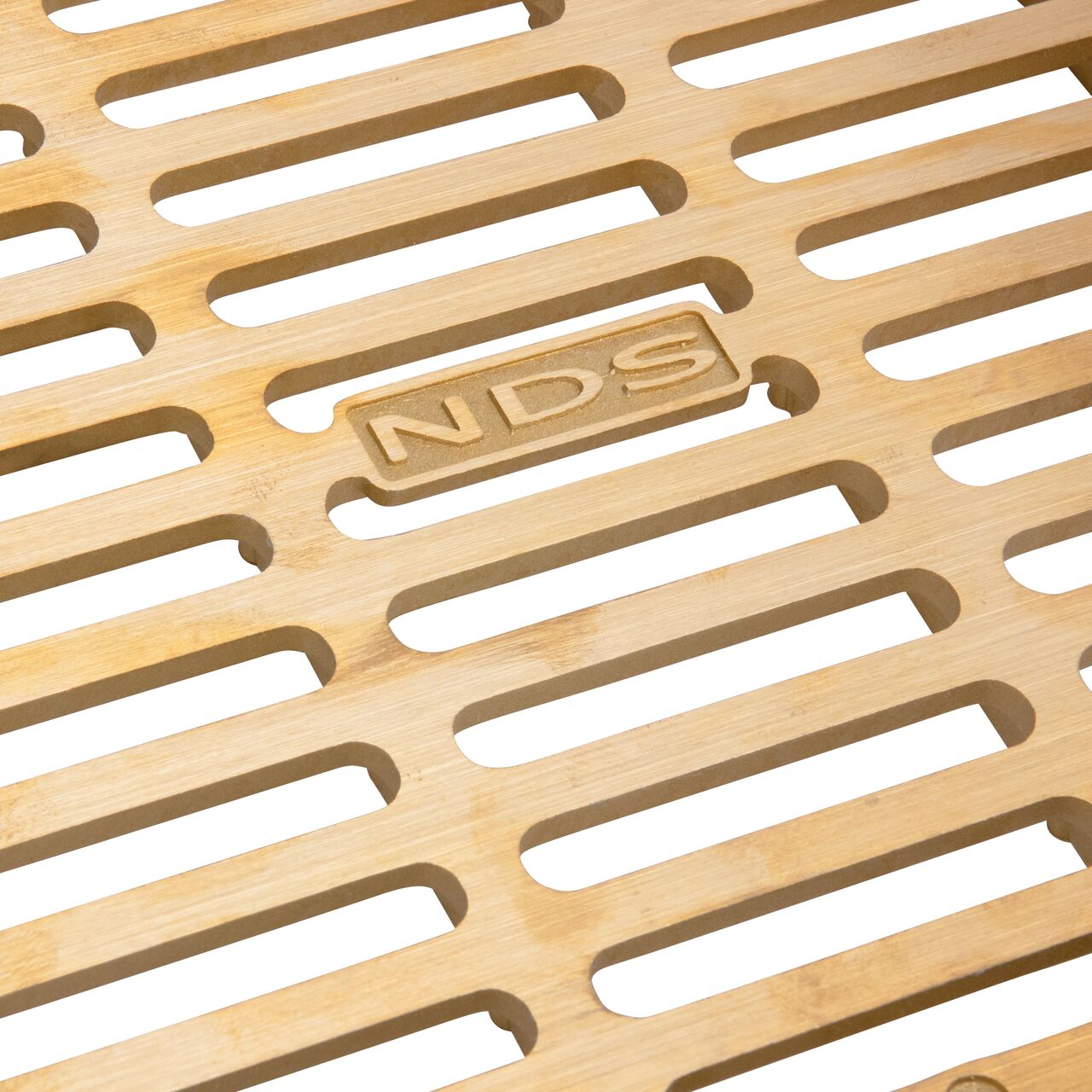 Closeup view of NDS 9 in. Square Catch Basin Drain Grate, Brass (NDS 930B)