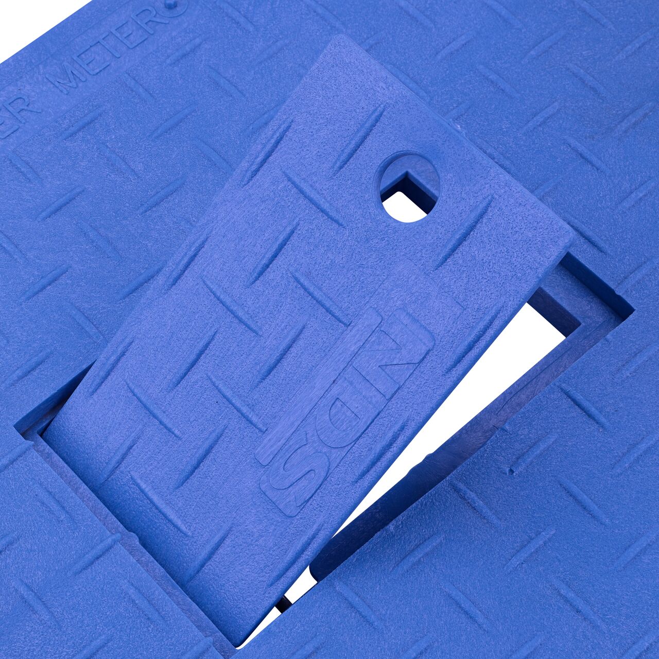 Close up view of the hinged side of the Plastic reader door on the Water Meter Blue Drop-in 13 in. X 20 in. Rectangular Standard Series Meter Cover which allows for easy meter reading (NDS D1500-DIRBLU)