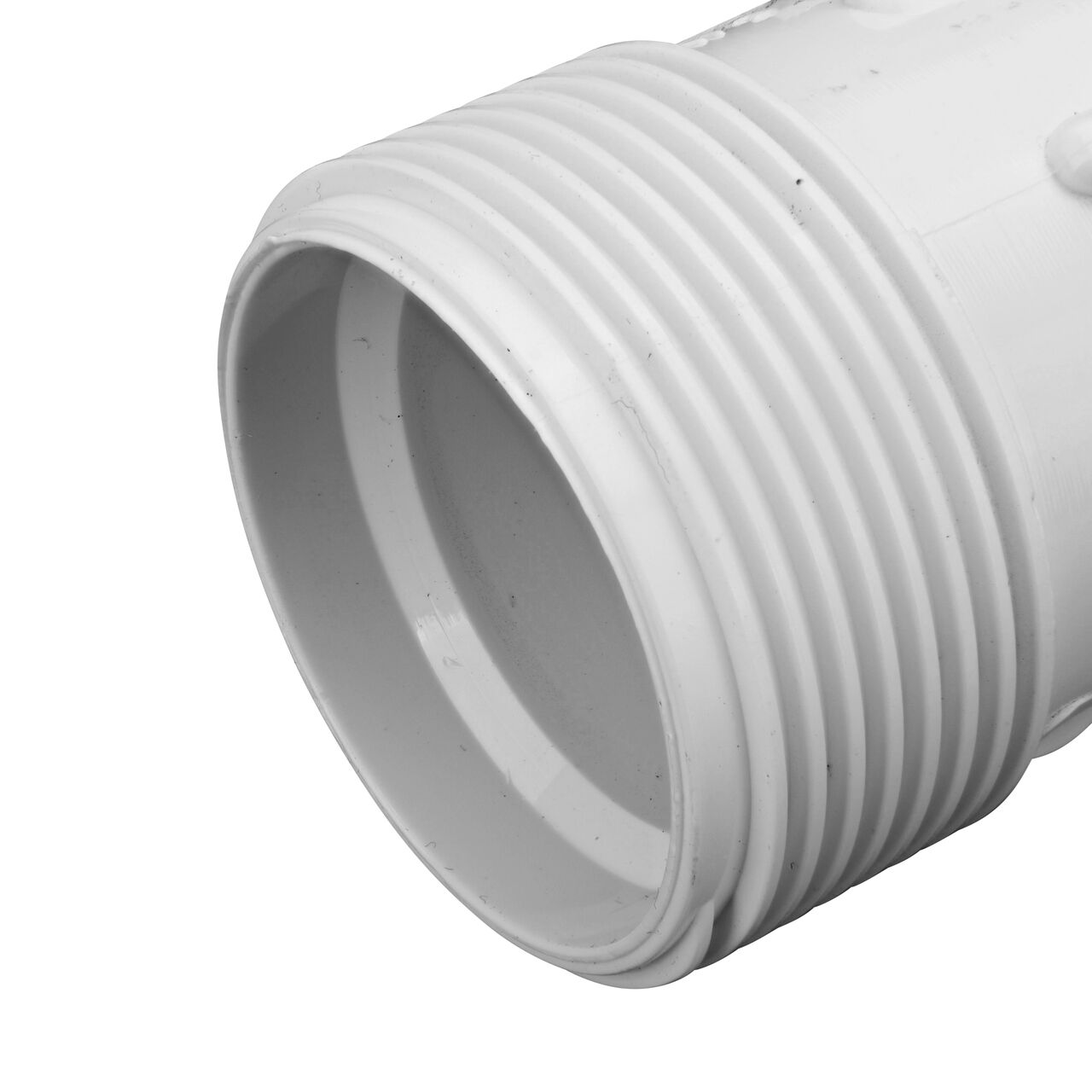 Closeup view of the PVC Compression Adapter, 1 in. IPS UC X 1 in. IPS showing MPT end that threads into FPT pipe which works with most plastic pipe to transport water and provide a leak-resistant connection (NDS CPA-1000)