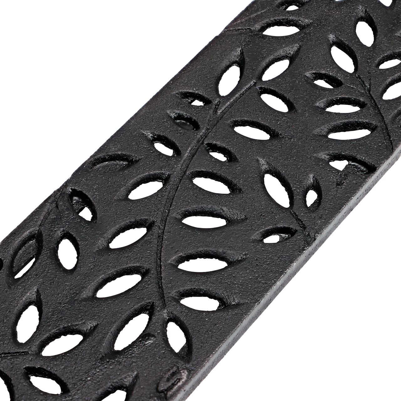 Closeup angled view of the Decorative Botanical Cast Iron Mini Channel™ Drain Grate (NDS 554CI)