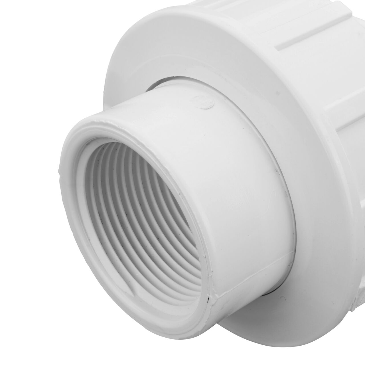 Closeup view of the other threaded end on the PVC Union, 1-1/4 in. Sch. 40 FPT X FPT (NDS WU-1250-T) which provides a corrosion-free connection between pipes and prevents costly property damage