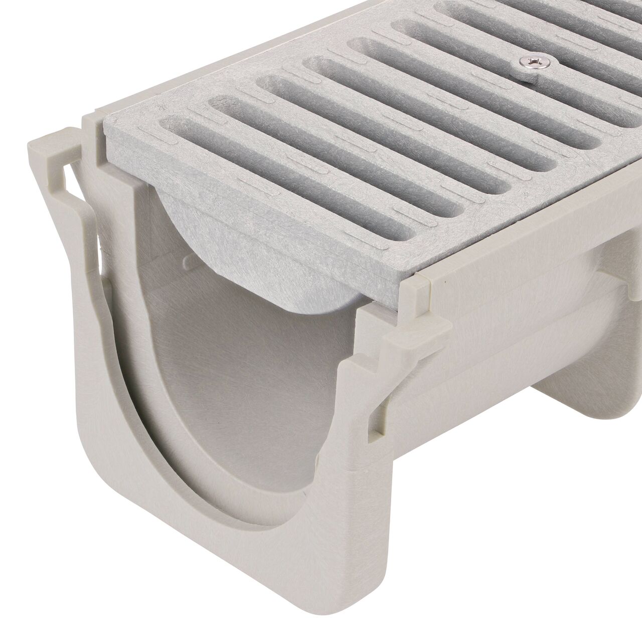Closeup View of the dark gray plastic Dura Slope™ Channel Drain Grate (NDS 661) installed on the Dura Slope Channel Drain (NDS DS-091)