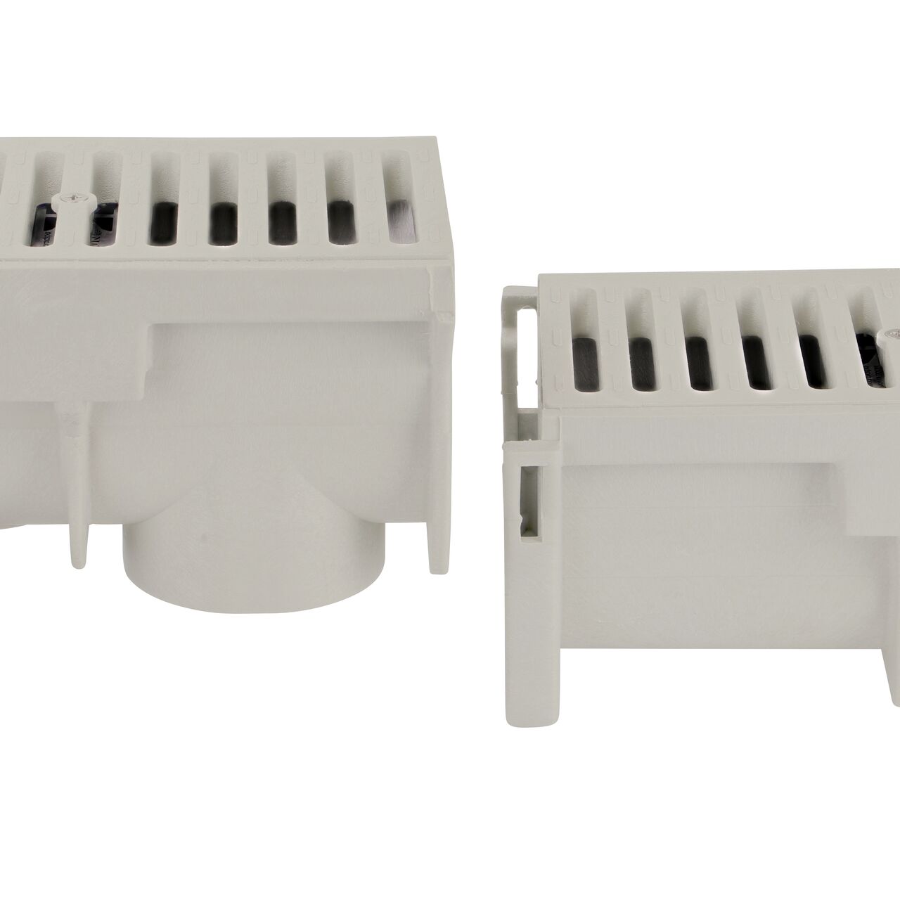 Lift the male end on the smaller channel to lock into the female end of the larger channel of the Dura Slope™ Channel Drain system shown with grates already installed (NDS DS-090N,  NDS DS-091, NDS DS-092, NDS DS-093, NDS DS-094, NDS DS-094N, NDS DS-095, NDS DS-096, NDS DS-097, NDS DS-097N, NDS DS-098, NDS DS-099, NDS DS-100, NDS DS-101, NDS DS-102, NDS 661LG)
