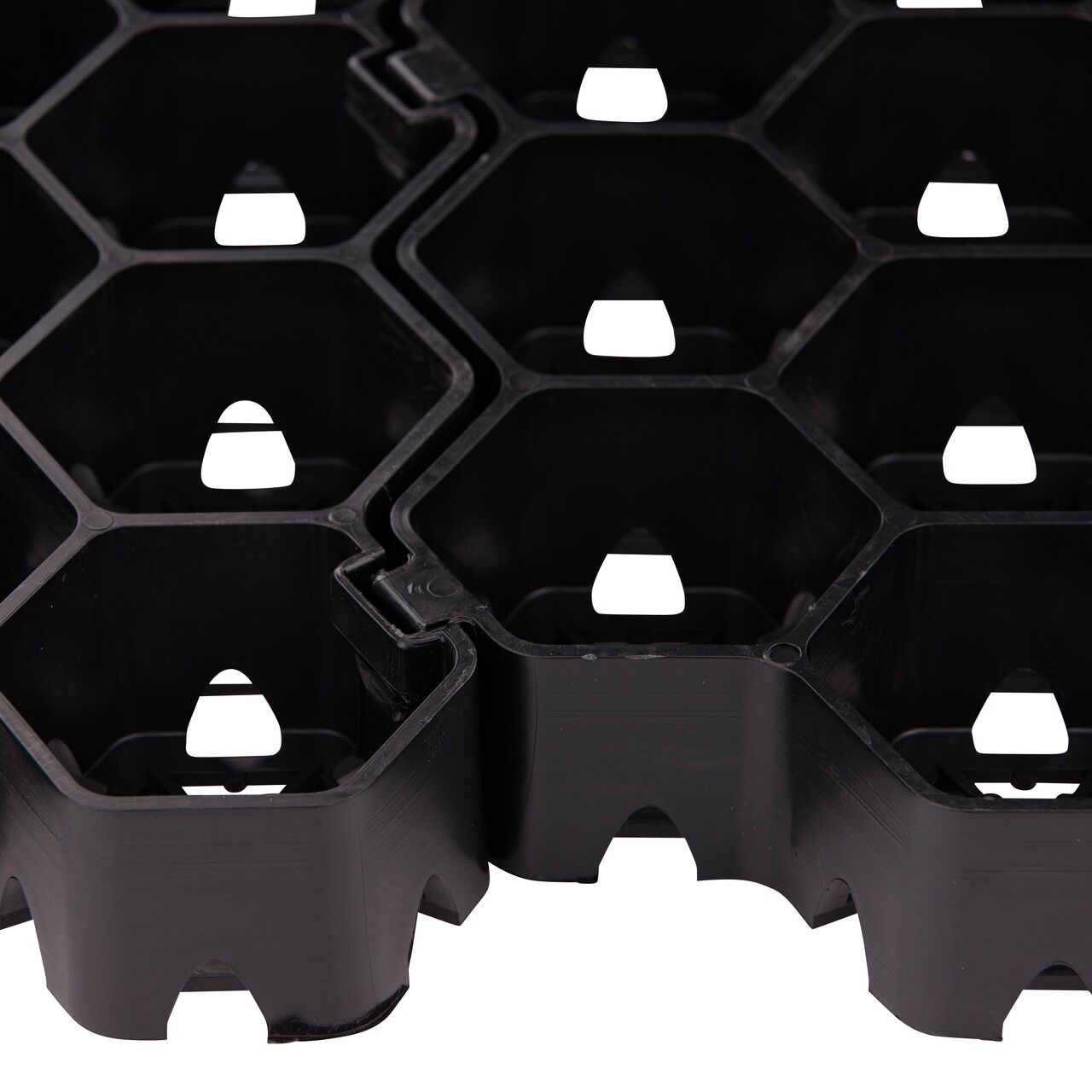 Step 3 to install the NDS Tufftrack Grass Pavers (NDS TT-24): Push down to clip panels together, the tongue-and-groove locking system will stay connected