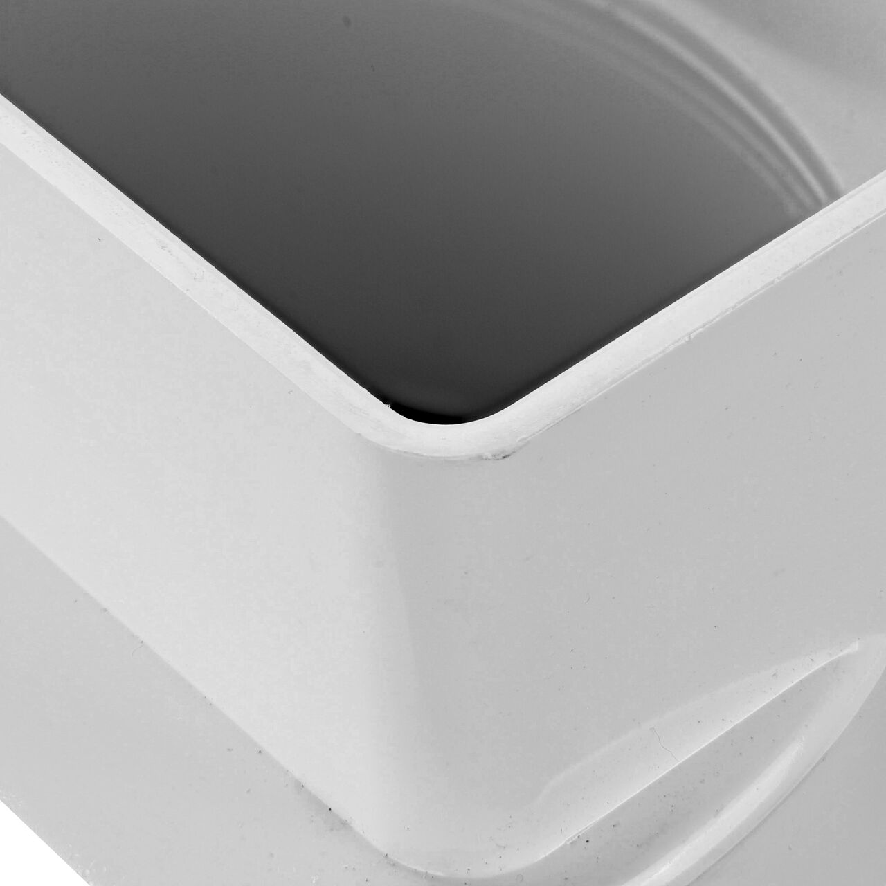 Closeup of the 6 in. S&D hub of the PVC offset downspout adapter (NDS 9P10)