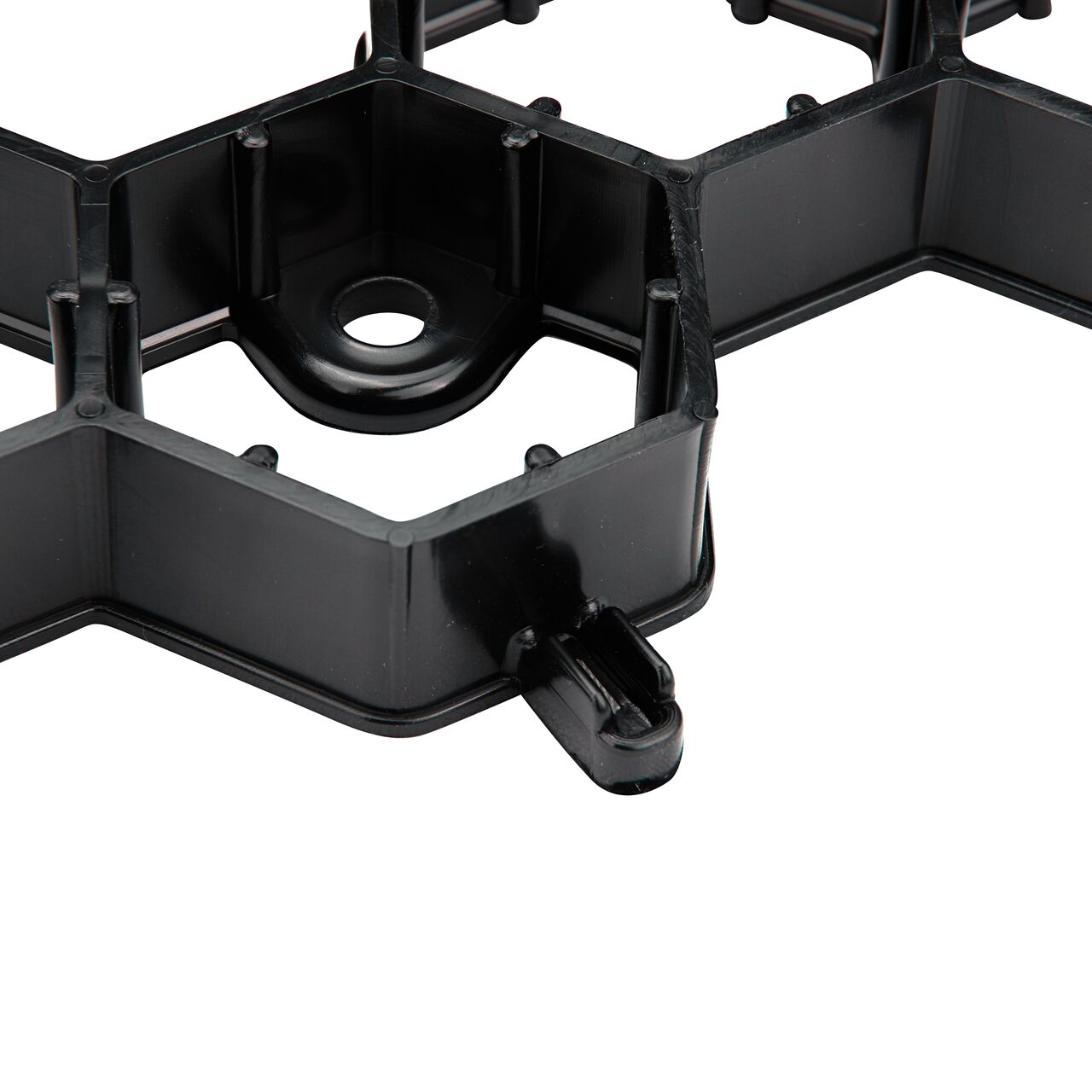 Closeup view of the end to end locking mechanism and the stake holder on the NDS EZ Roll® Grass Pavers