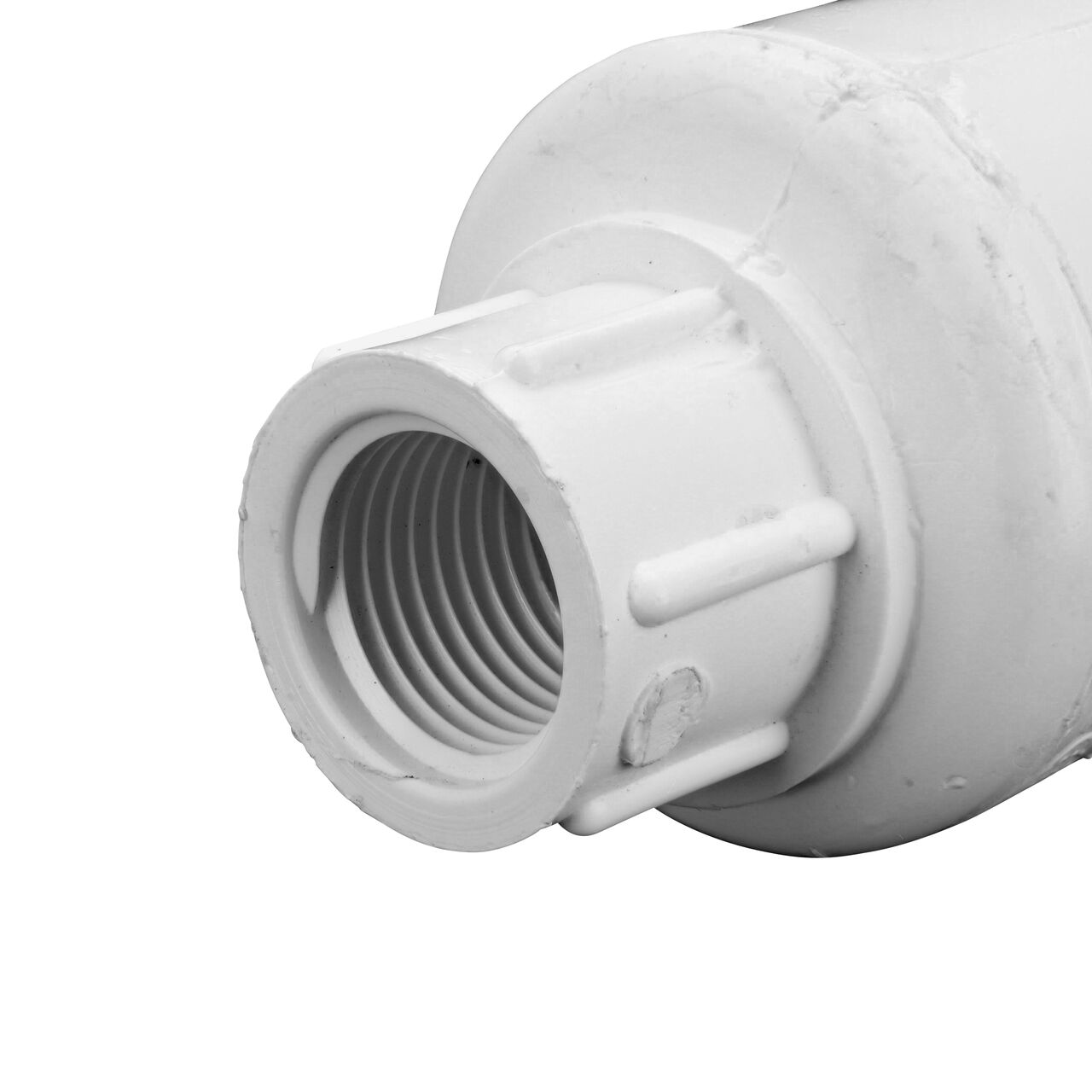 Closeup of the inlet end on the NDS White 1/2 in. female end by female end PVC Swing Check Valve (NDS 1520-05F) which prevents backflow in pipelines