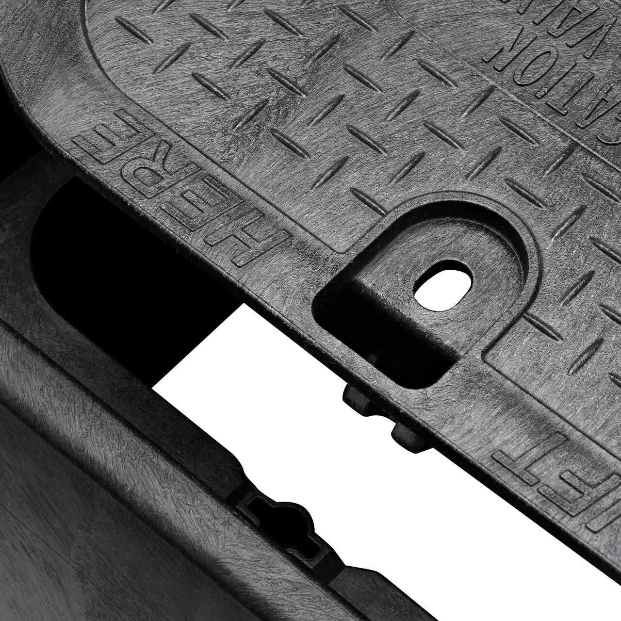 Align the bolt hole on the lid with the bolt hole from the NDS 14 X 19 in. Rectangular Standard Series Black Box and Black Irrigation Control Valve Cover (NDS 113BCBLK) for a secure fit