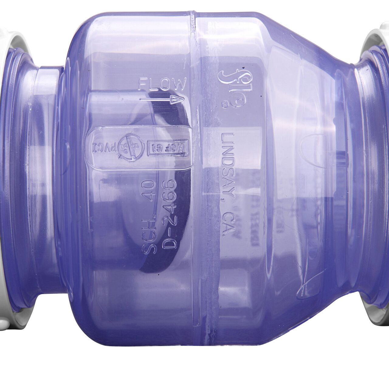 Closeup of the directional arrows showing which water the water flows through the NDS Clear 2 in. IPS U X U PVC True Union Swing Check Valve (NDS 1720C20)
