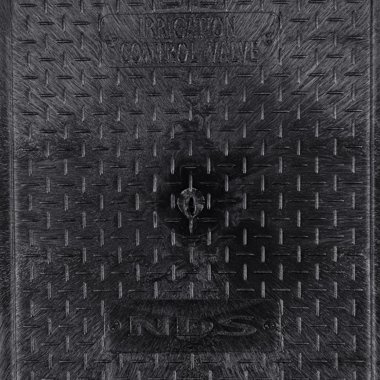 Closeup view of the Irrigation Control Valve markings on the Black Irrigation Control Valve cover (NDS 313CBLK) for the NDS 14 in. X 19 in. Rectangular Pro-Spec® Series Valve Box